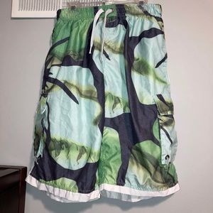 B. SplitGreen Hawaiian Flower Swim Trunks. Size: S